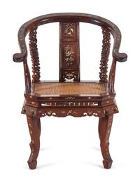 An Embelished Huanghuali Armchair