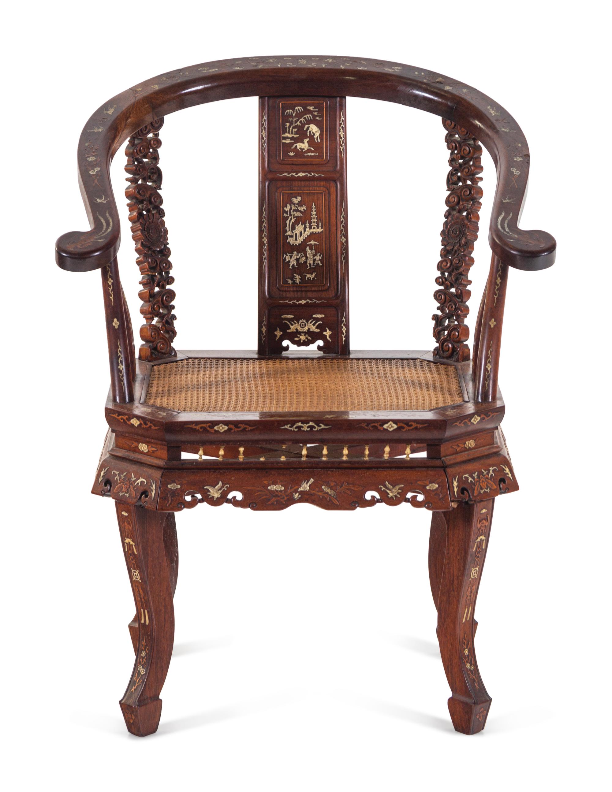 An Embelished Huanghuali Armchair