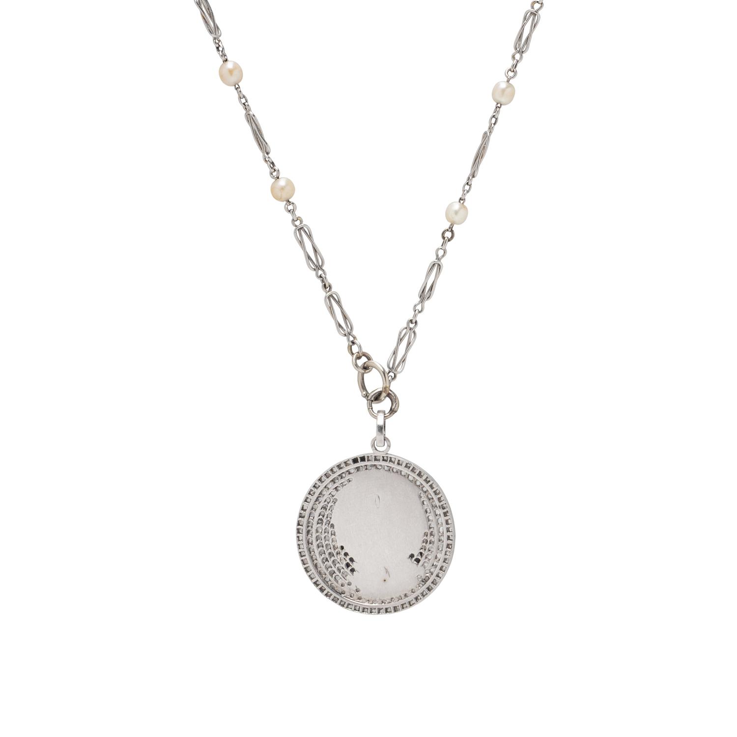 CAMEO, DIAMOND, AND SEED PEARL PENDANT NECKLACE