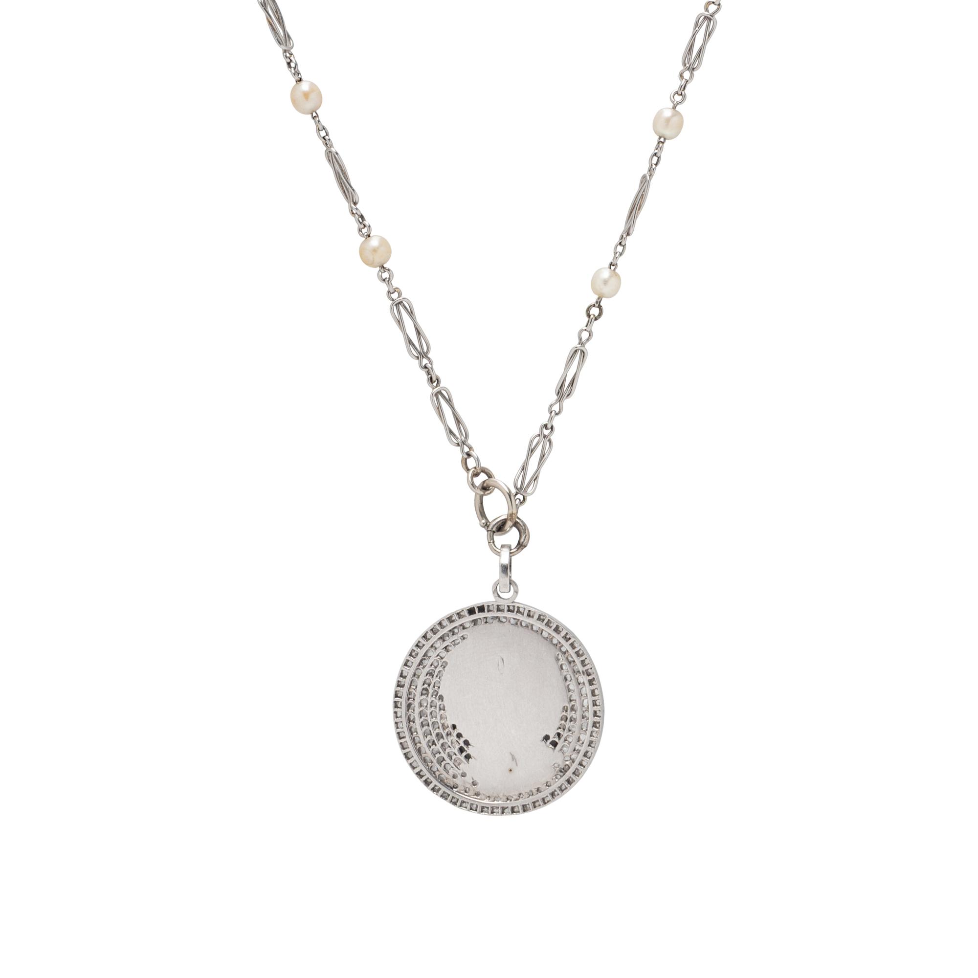 CAMEO, DIAMOND, AND SEED PEARL PENDANT NECKLACE
