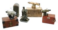 A Group of Four Cased Surveying Instruments Length of longest scope 10 1/2 inches. — 20TH CENTURY