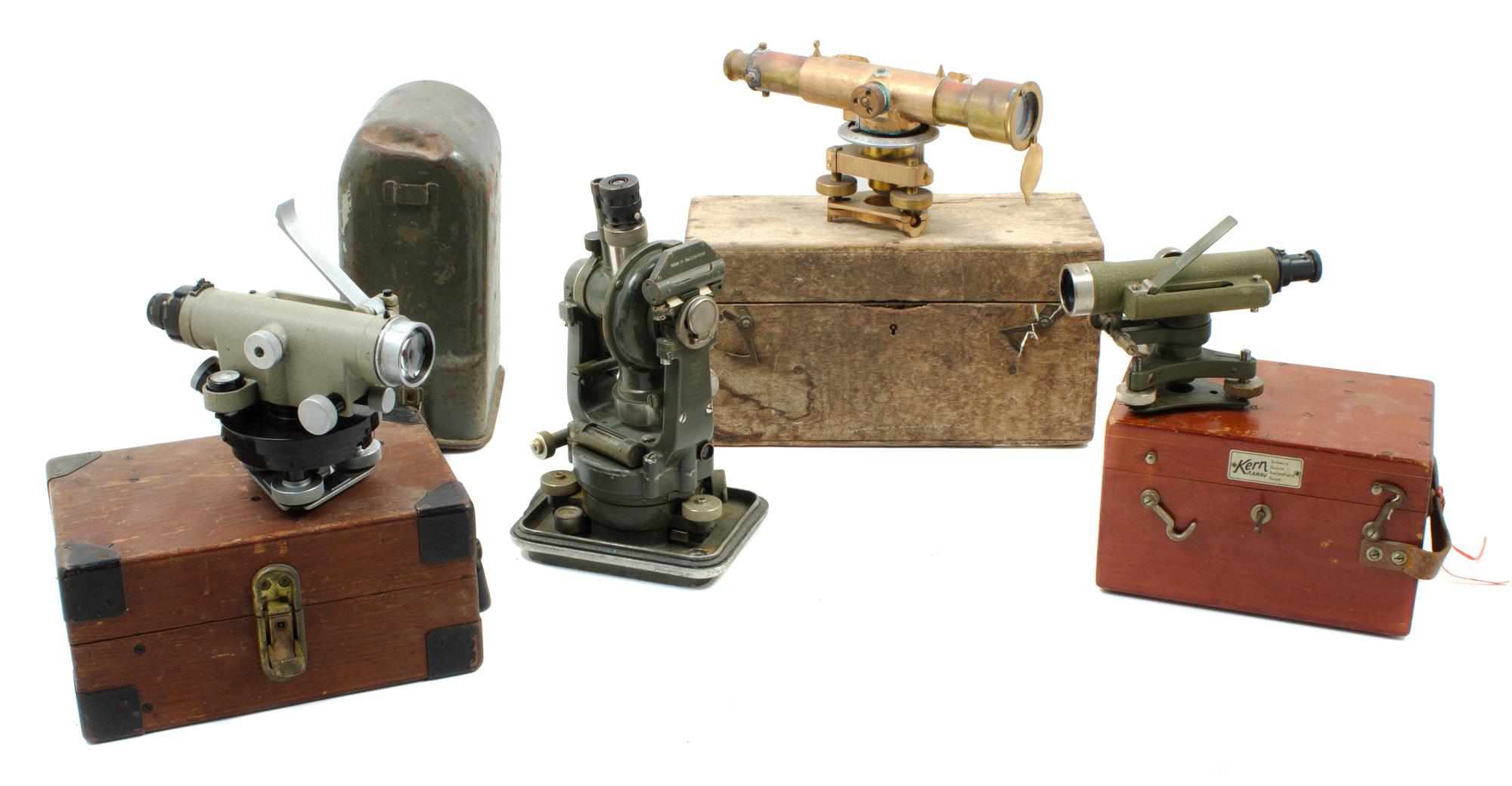 A Group of Four Cased Surveying Instruments Length of longest scope 10 1/2 inches. — 20TH CENTURY
