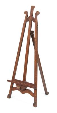 An English Carved and Stained Oak Easel — LATE 19TH/EARLY 20TH CENTURY