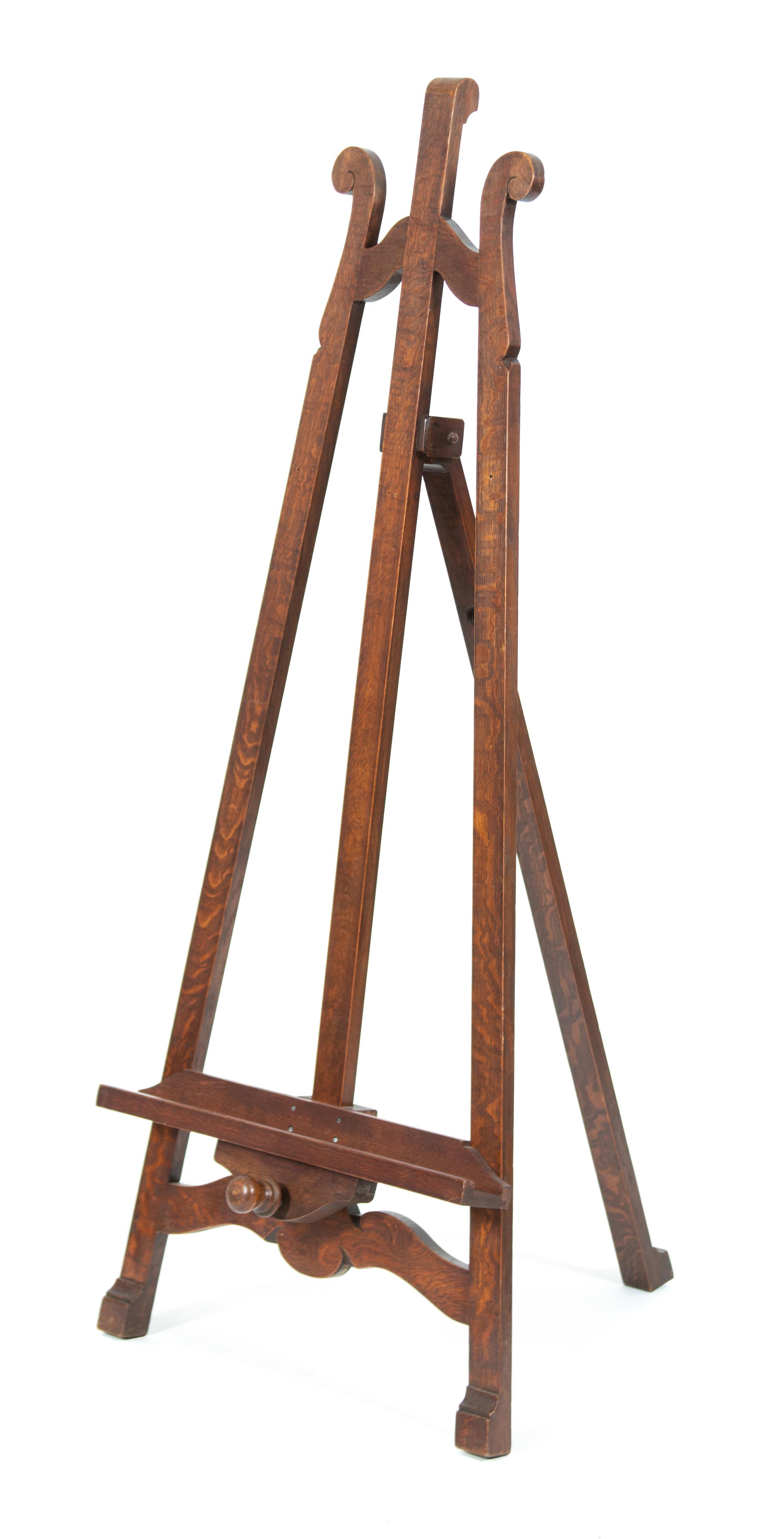 An English Carved and Stained Oak Easel — LATE 19TH/EARLY 20TH CENTURY