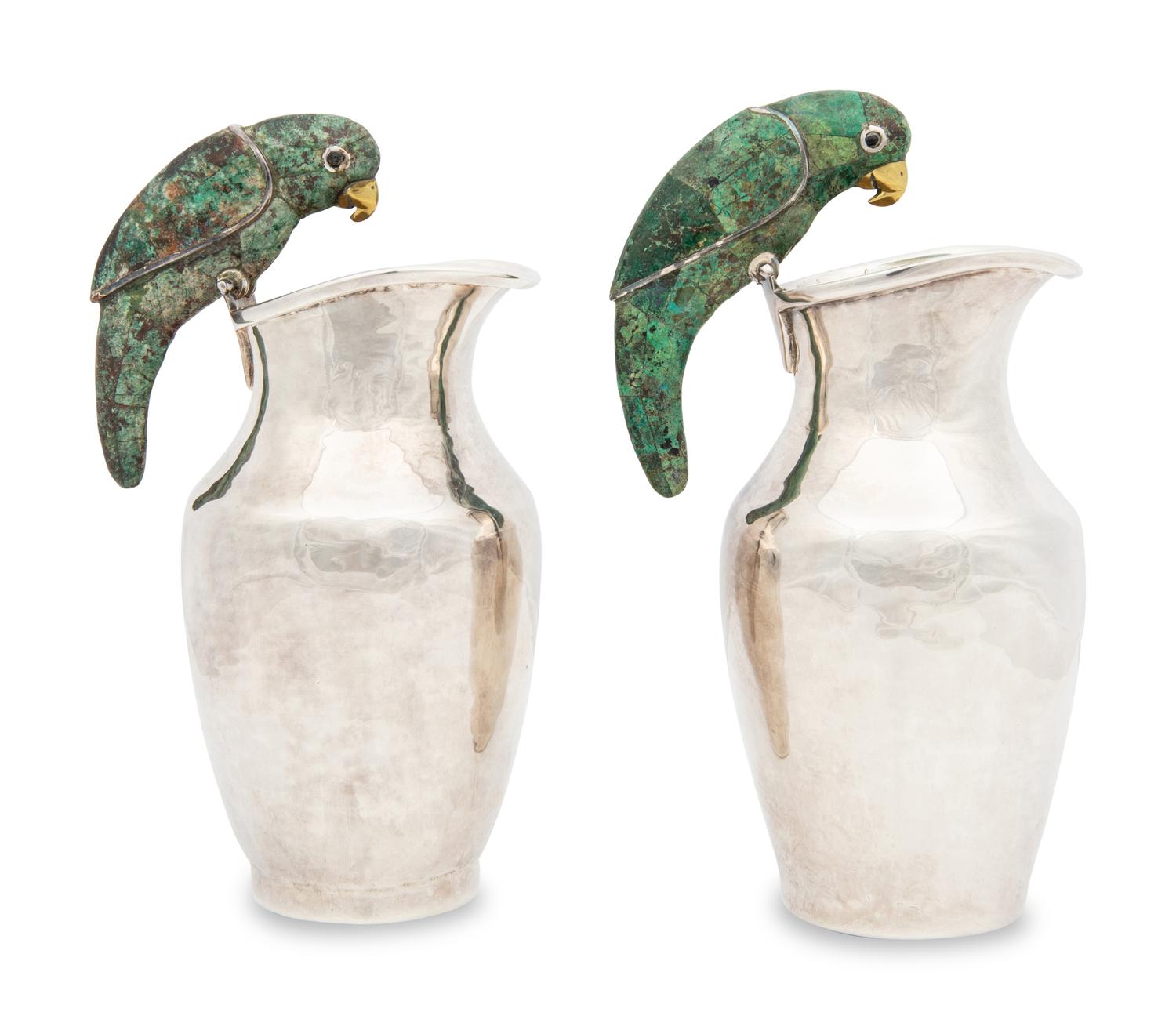 A Pair of Los Castillo Silver Pitchers