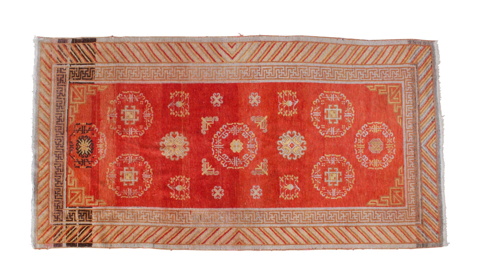 A Persian Wool Rug 8 feet 10 1/2 inches x 4 feet 8 inches.