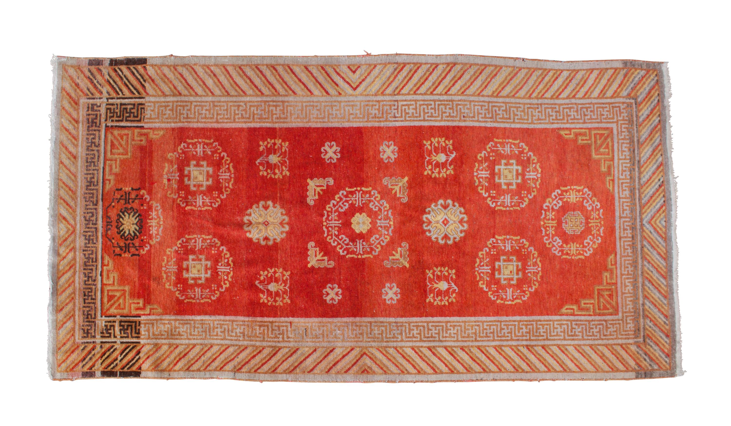 A Persian Wool Rug 8 feet 10 1/2 inches x 4 feet 8 inches.
