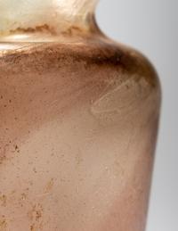 A Roman Aubergine Glass Vessel