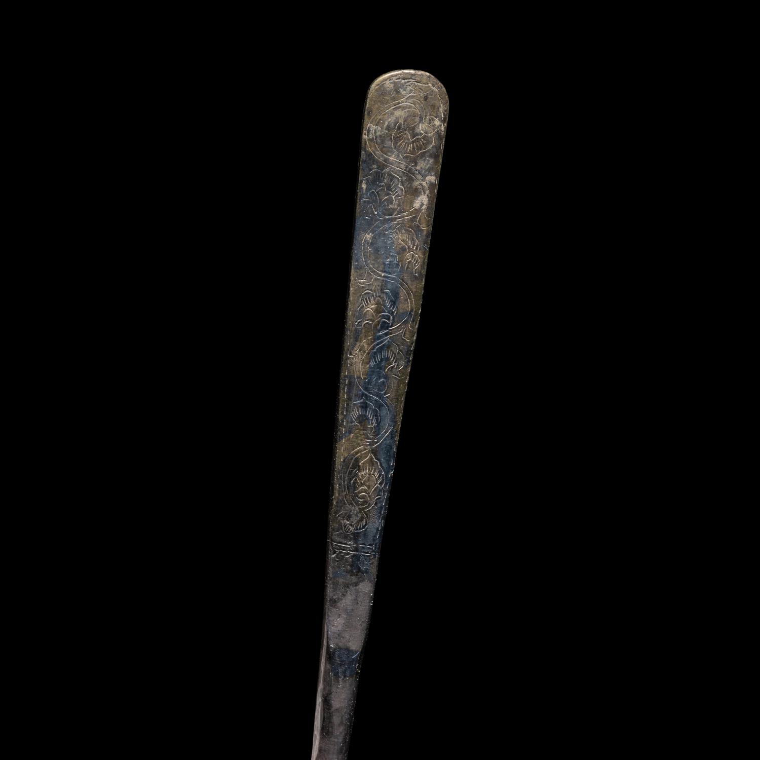 A Chinese Parcel-Gilt Silver 'Peony' Ladle, Liao Dynasty 遼 銀局部鎏金牡丹紋長勺