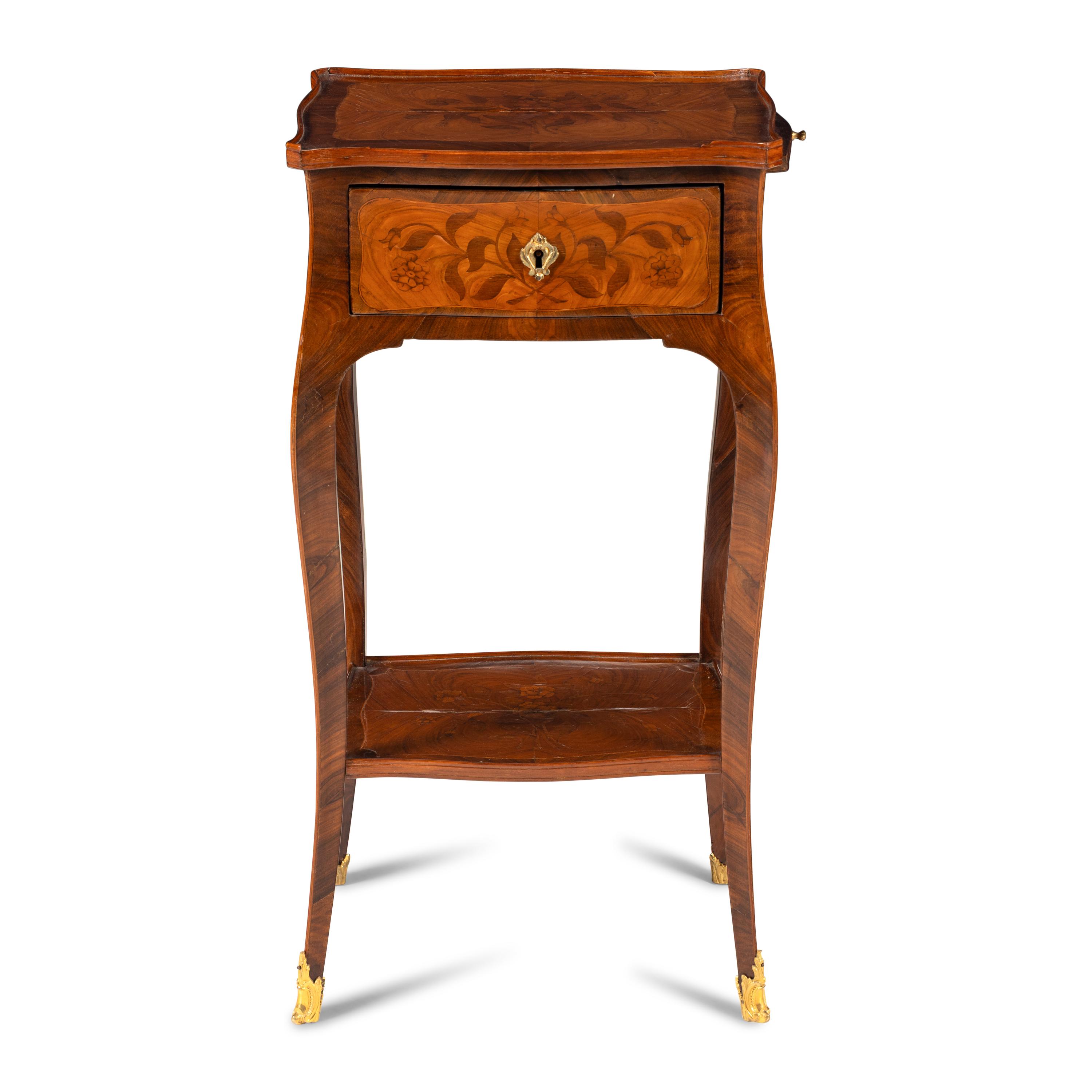 A Louis XV Gilt Bronze Mounted Kingwood, Tulipwood and Floral Marquetry Occasional Table