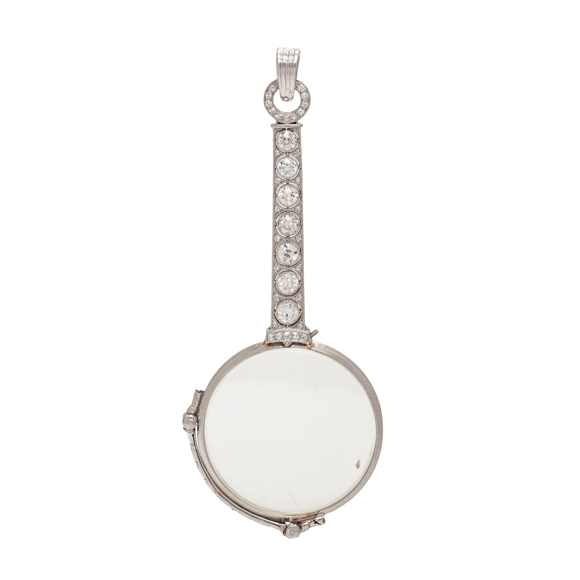 ART DECO, PLATINUM AND DIAMOND LORGNETTE PENDANT