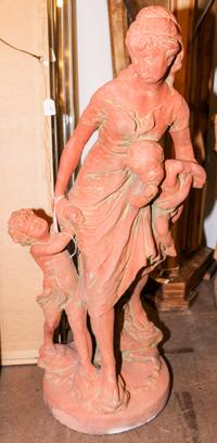 A Terra Cotta Statue of a Mother and Child. Height 36 inches.