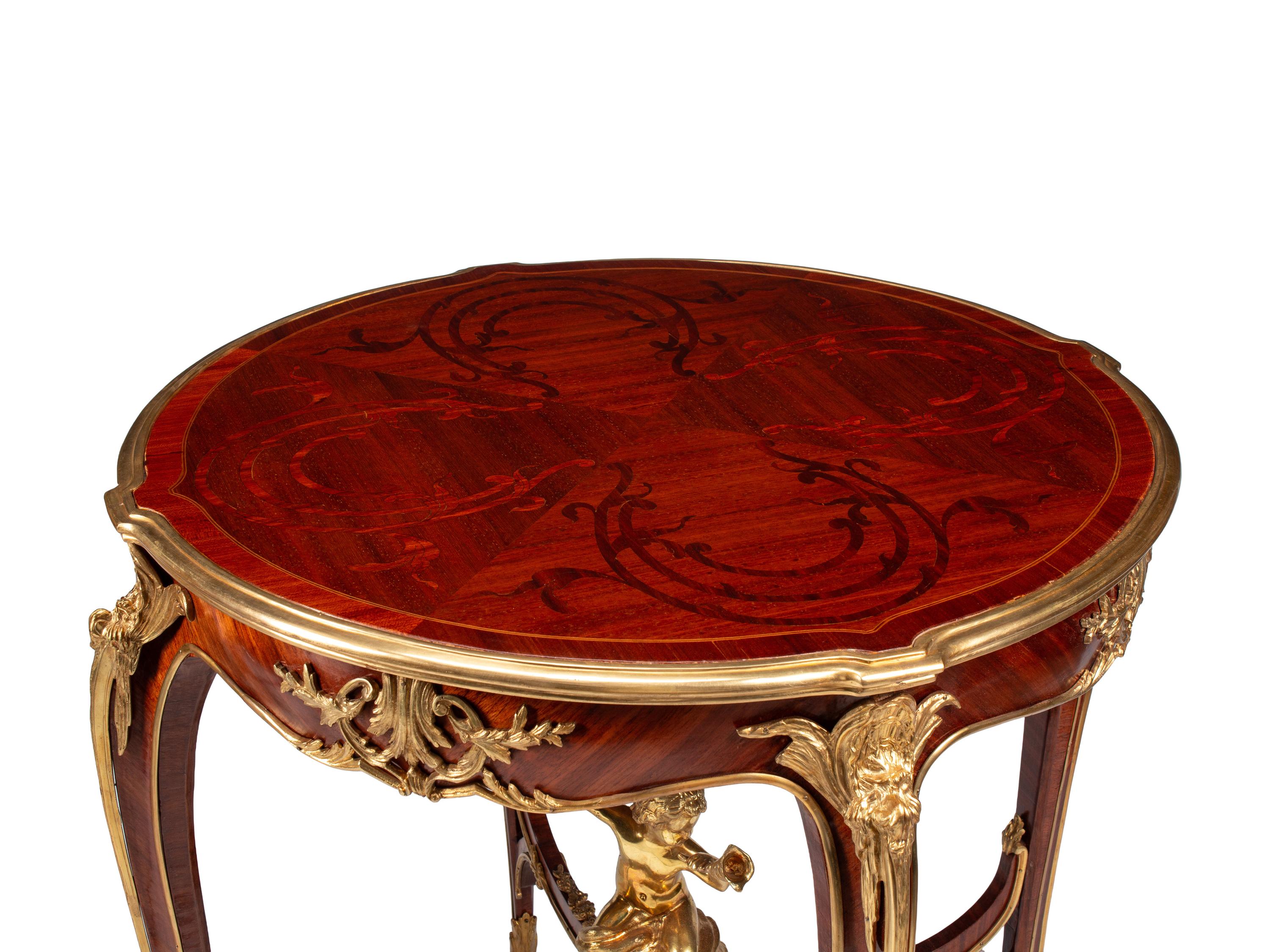 A Pair of Louis XV Style Gilt Bronze Mounted Marquetry Side Tables