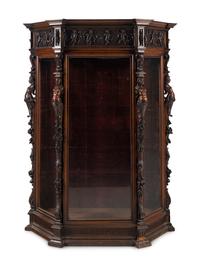 An Italian Renaissance Revival Carved Walnut Cabinet
