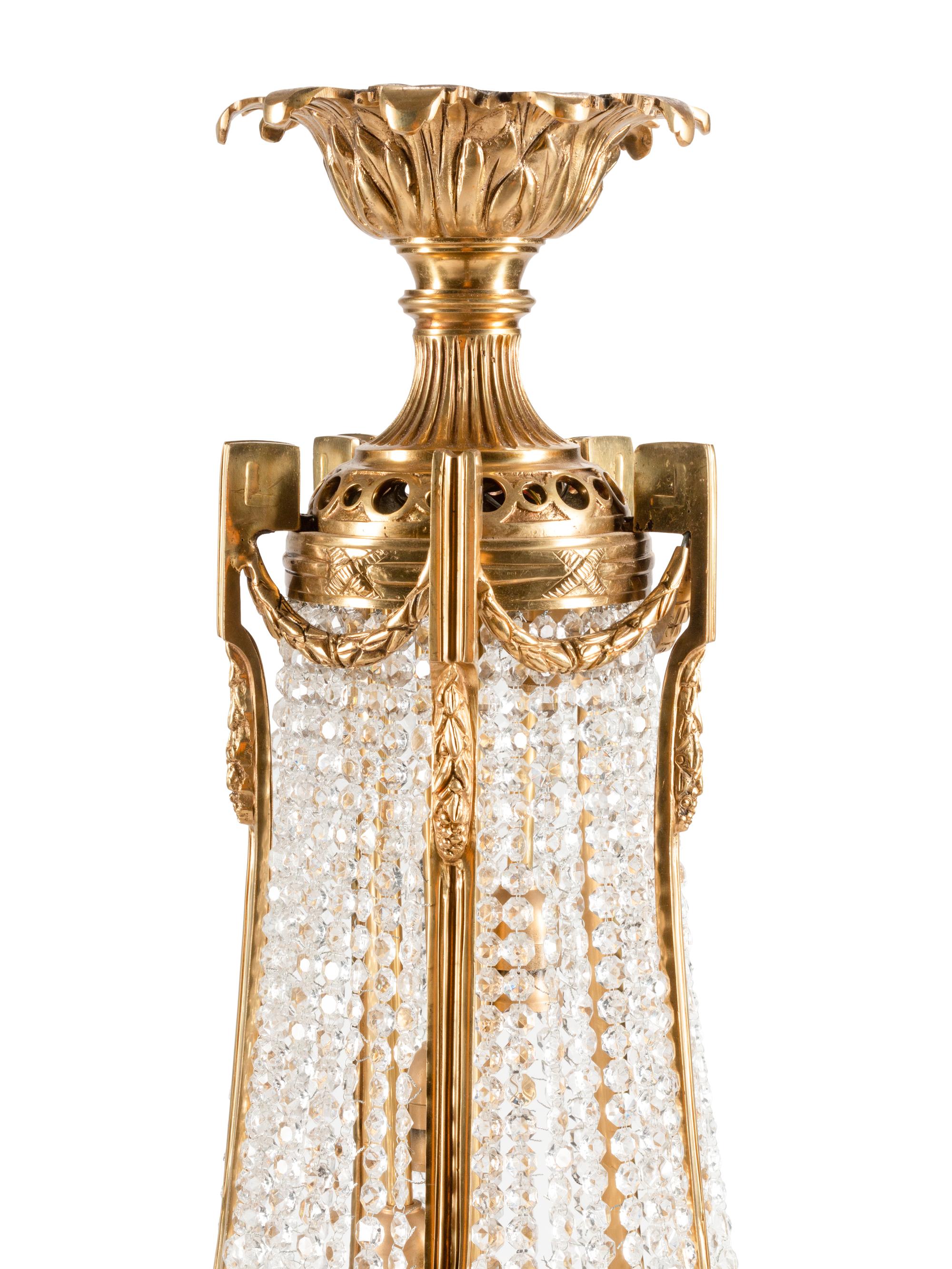 A Pair of French Neoclassical Style Gilt Bronze Chandeliers