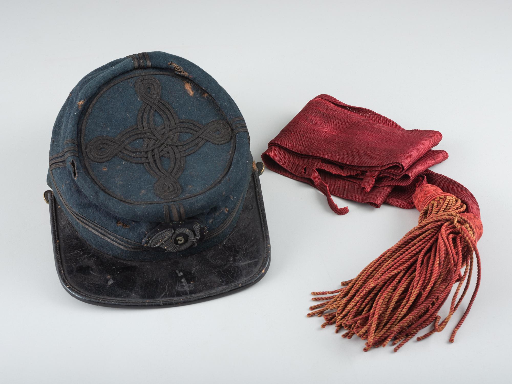 [CIVIL WAR]. Chasseur-style cap with 3rd regiment number and insignia and officer's sash.