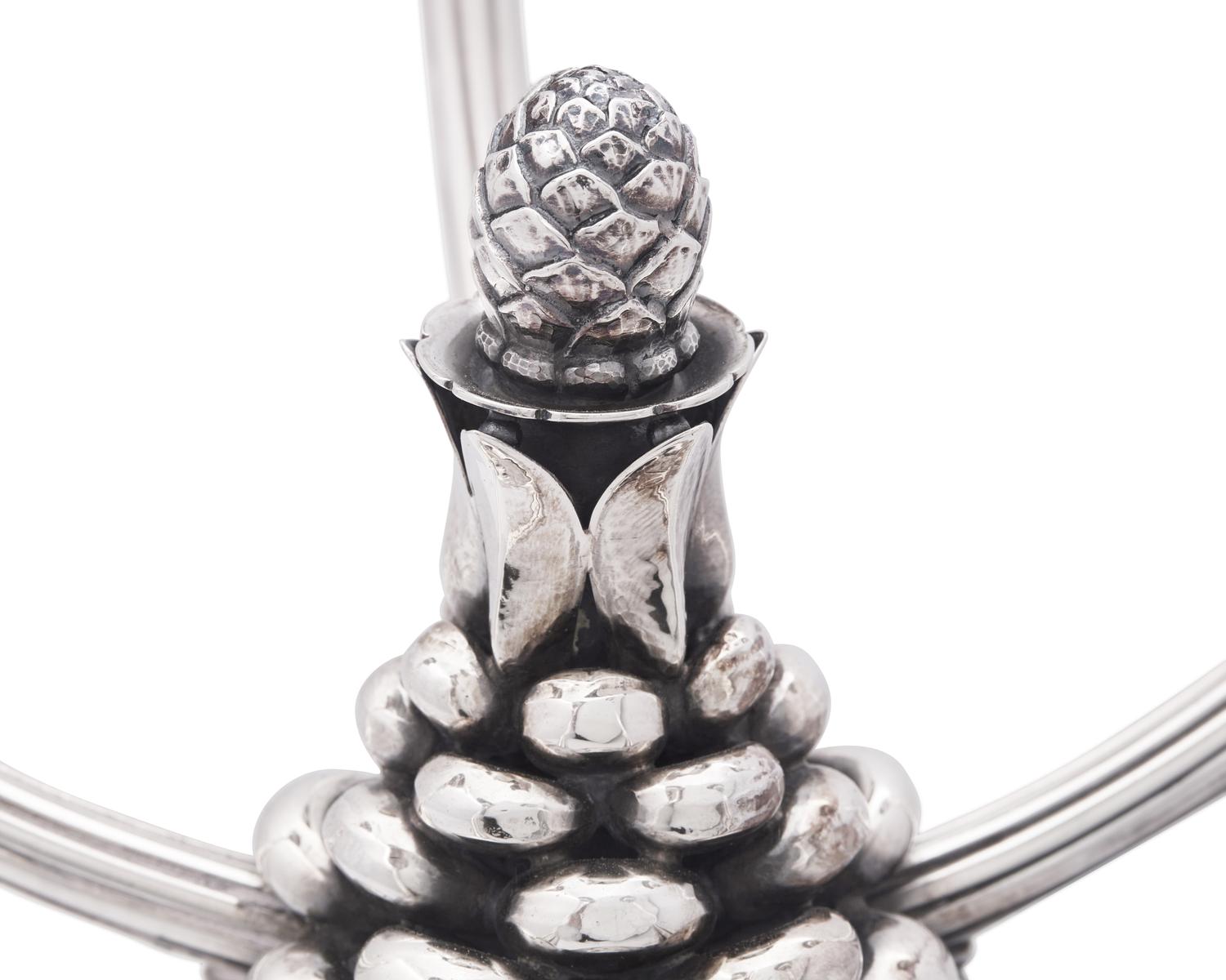 A Pair of Johan Rohde Designed Georg Jensen Silver Acorn Pattern Five-Light Candelabra