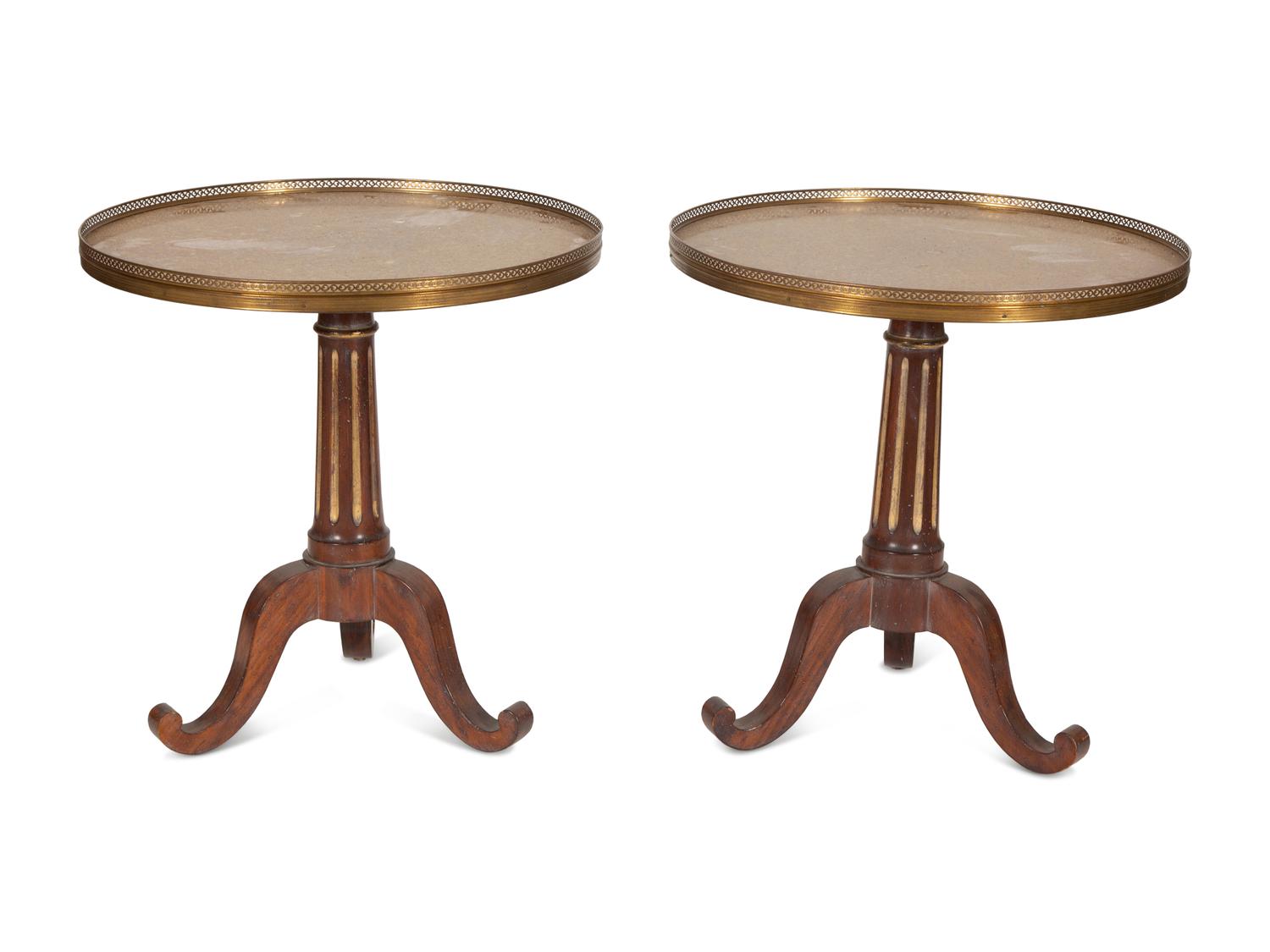 A Pair of French Empire Style Mahogany and Parcel Gilt Gueridons with Faux Granite Tops