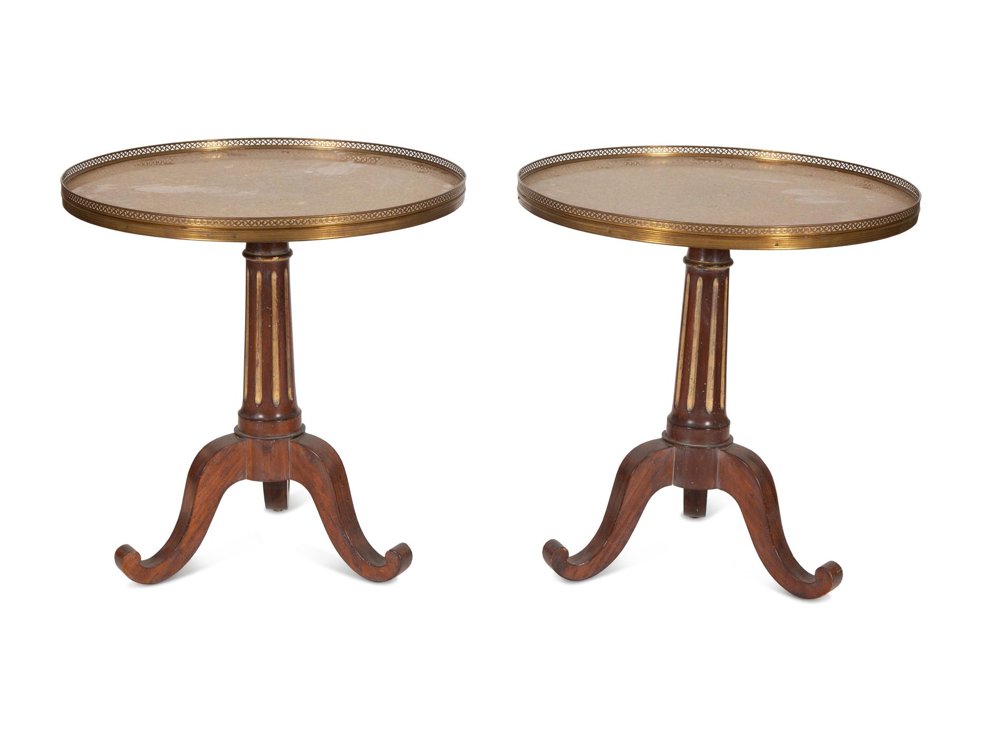 A Pair of French Empire Style Mahogany and Parcel Gilt Gueridons with Faux Granite Tops