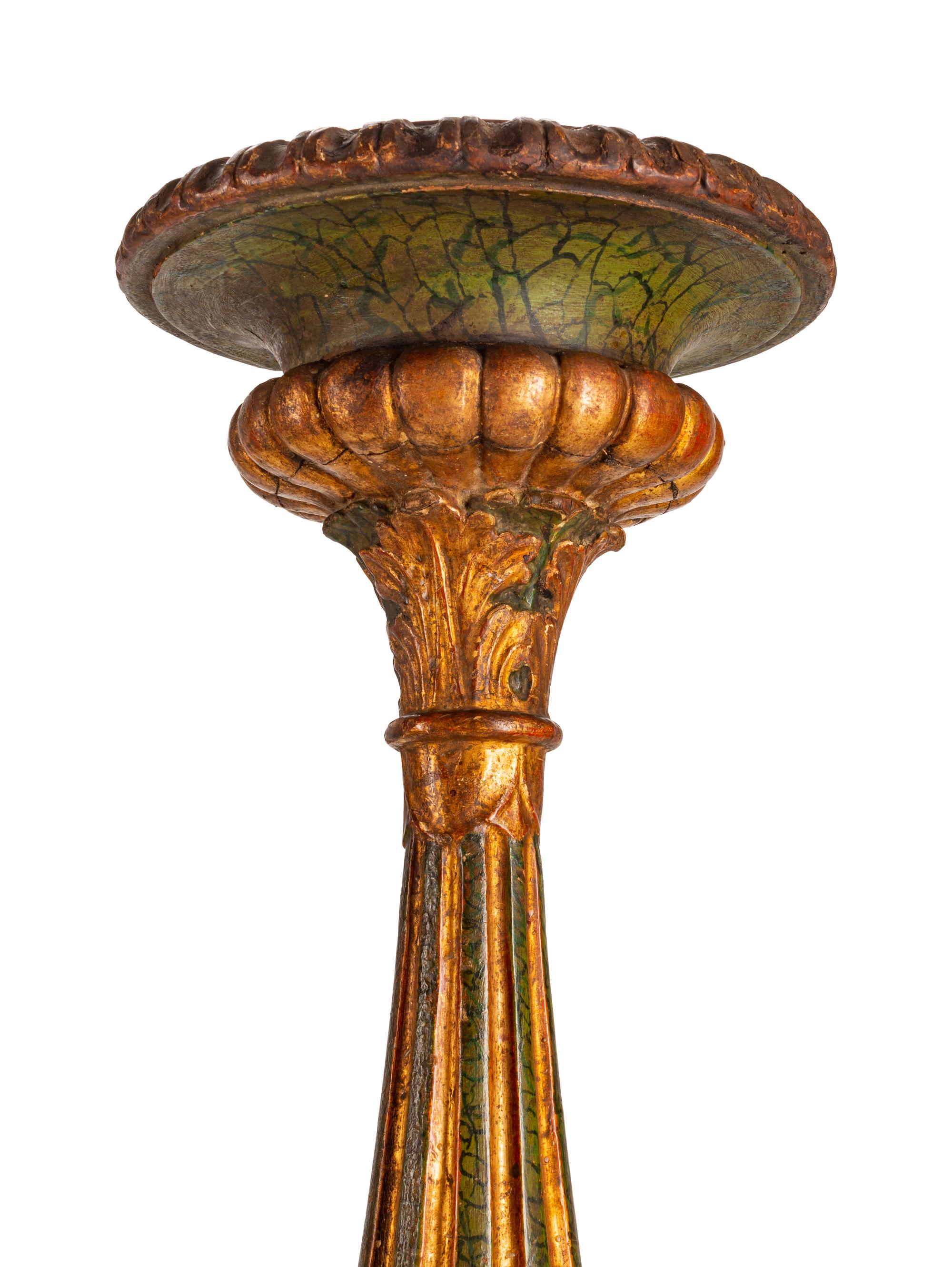 A Pair of Italian Parcel-Gilt and Painted Torcheres