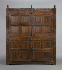A Renaissance Revival Oak Cabinet, Height 89 x width 74 3/4 x depth 16 1/4 inches.