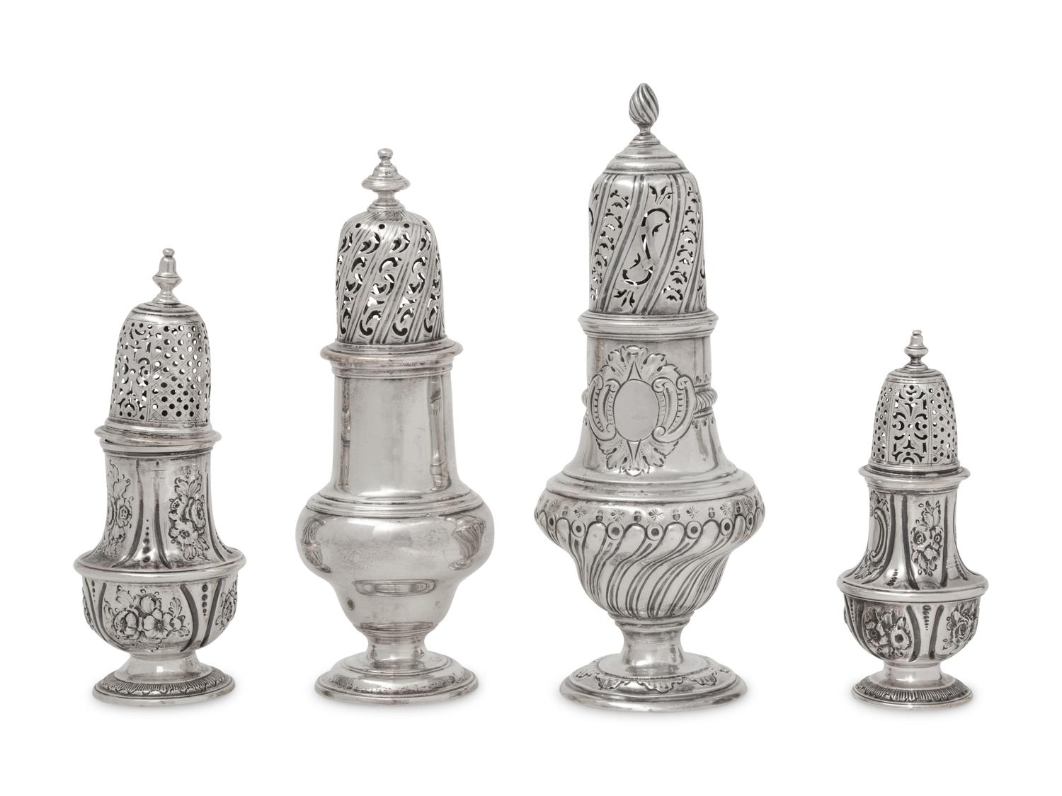 A Group of Four English Silver Casters and Muffineers