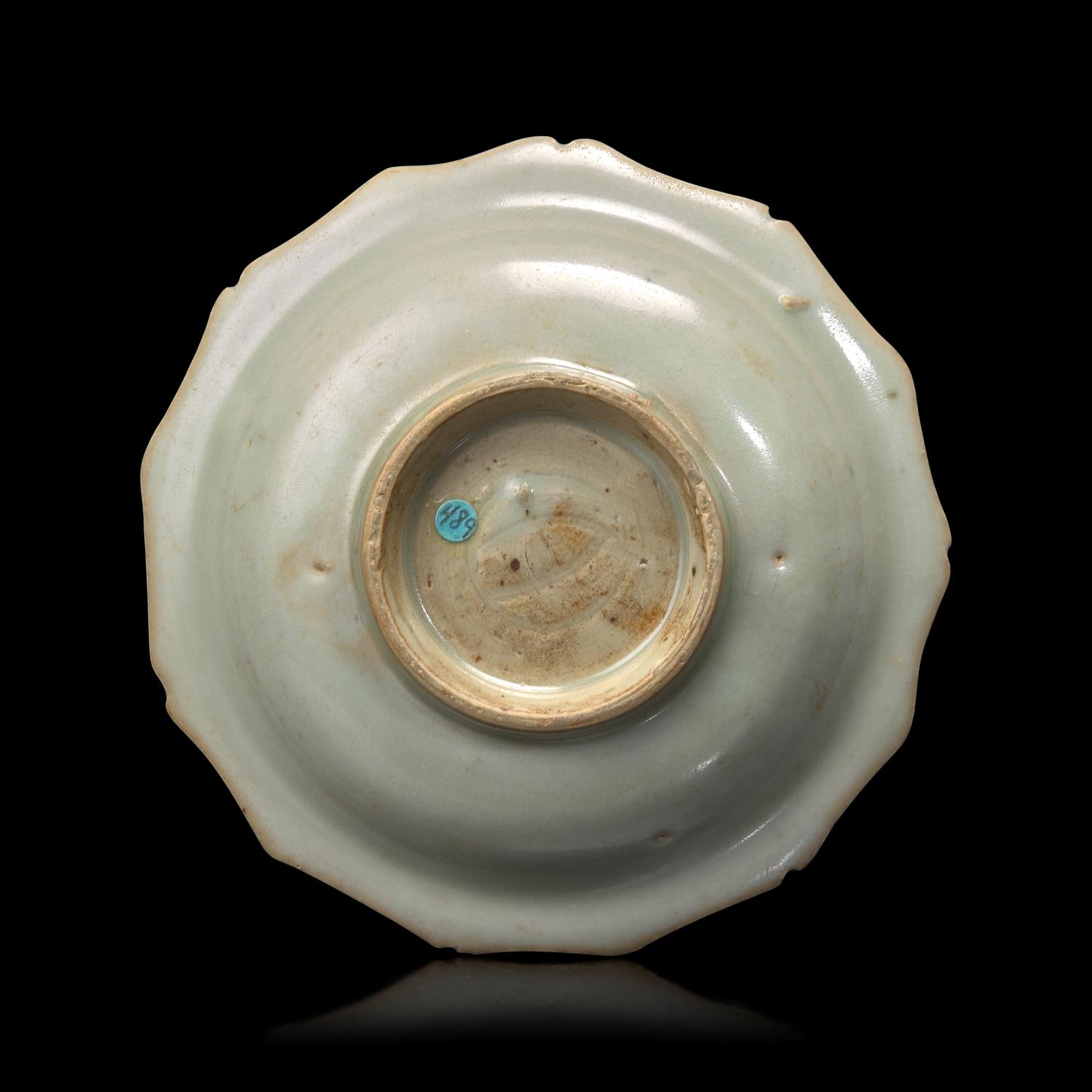 A Small Chinese White Glazed Barbed Dish, Yuan Dynasty 元 白釉花口碟