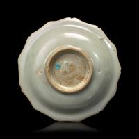 A Small Chinese White Glazed Barbed Dish, Yuan Dynasty 元 白釉花口碟