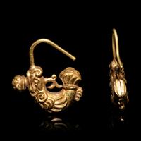 A Matched Pair of Chinese Gold 'Capricorn' Earrings, Erhuan, Liao Dynasty 遼 摩羯形金耳環兩隻