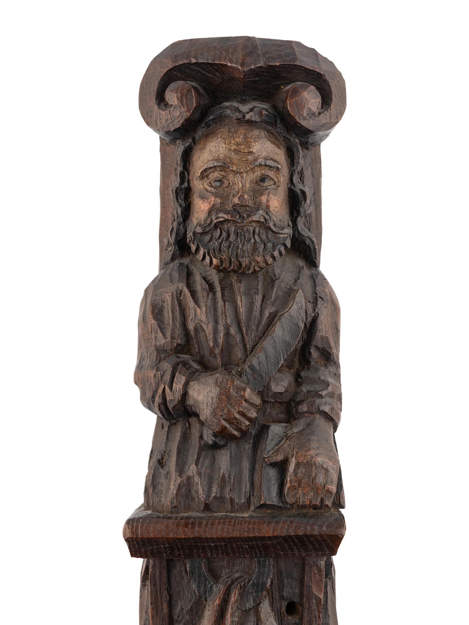 A Carved Oak and Polychrome Decorated Figural Pilaster