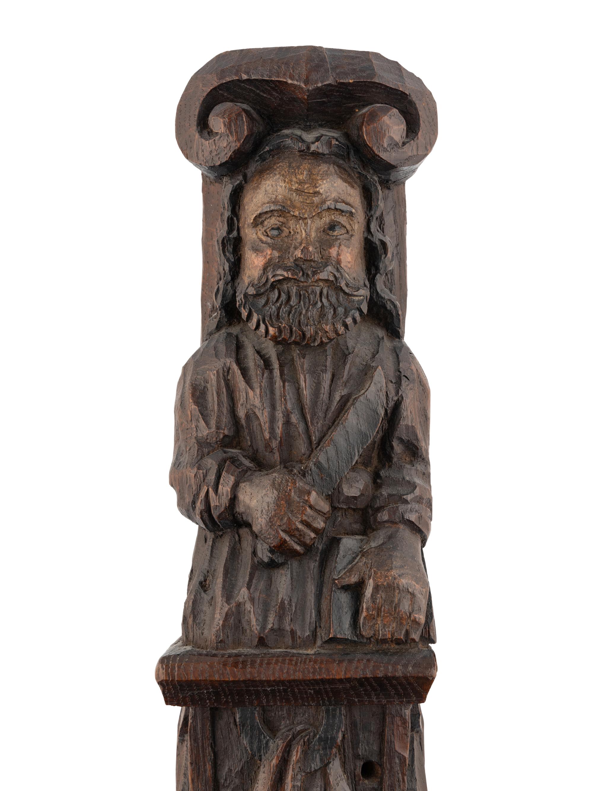 A Carved Oak and Polychrome Decorated Figural Pilaster