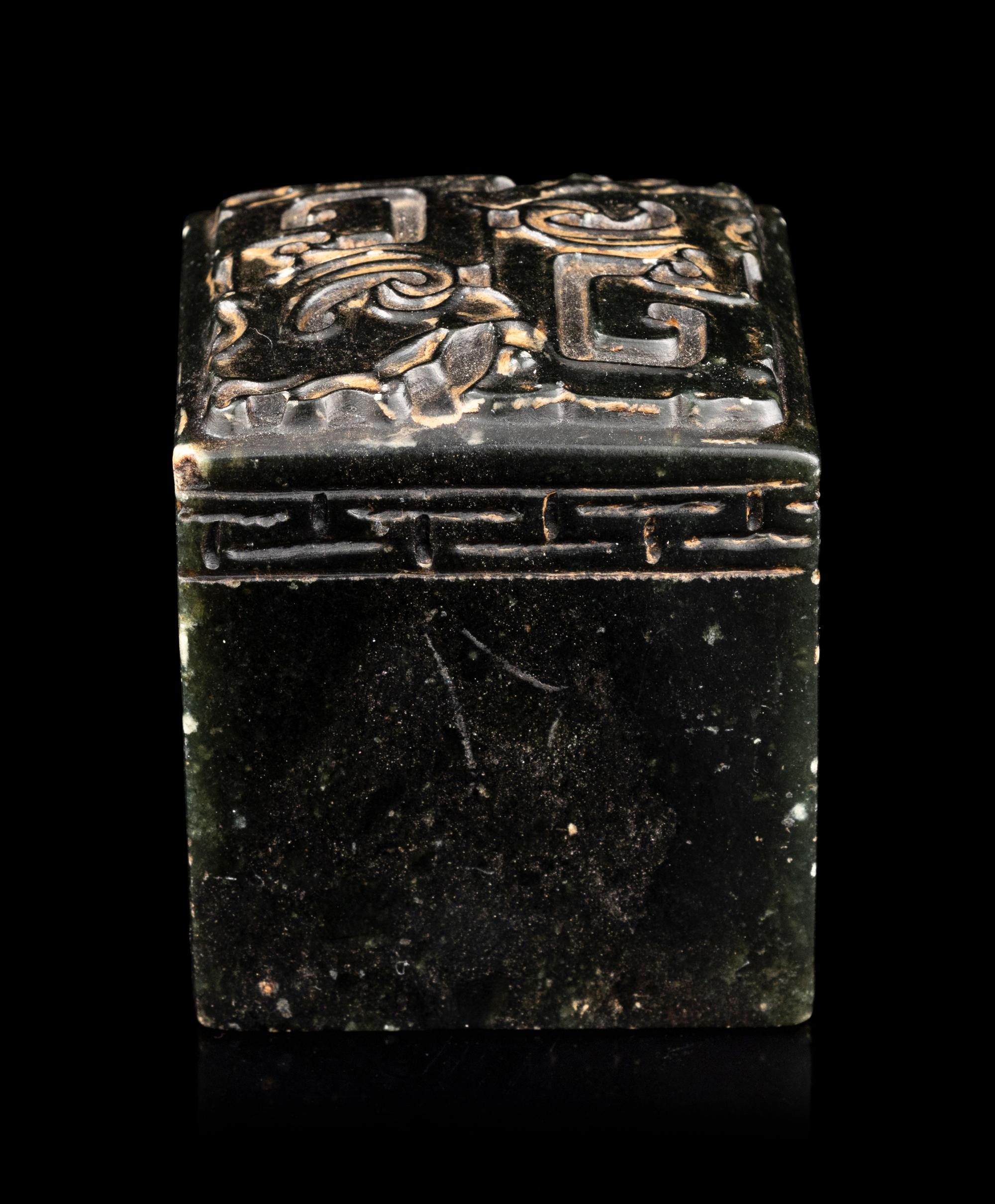 A Carved Spinach Jade Seal