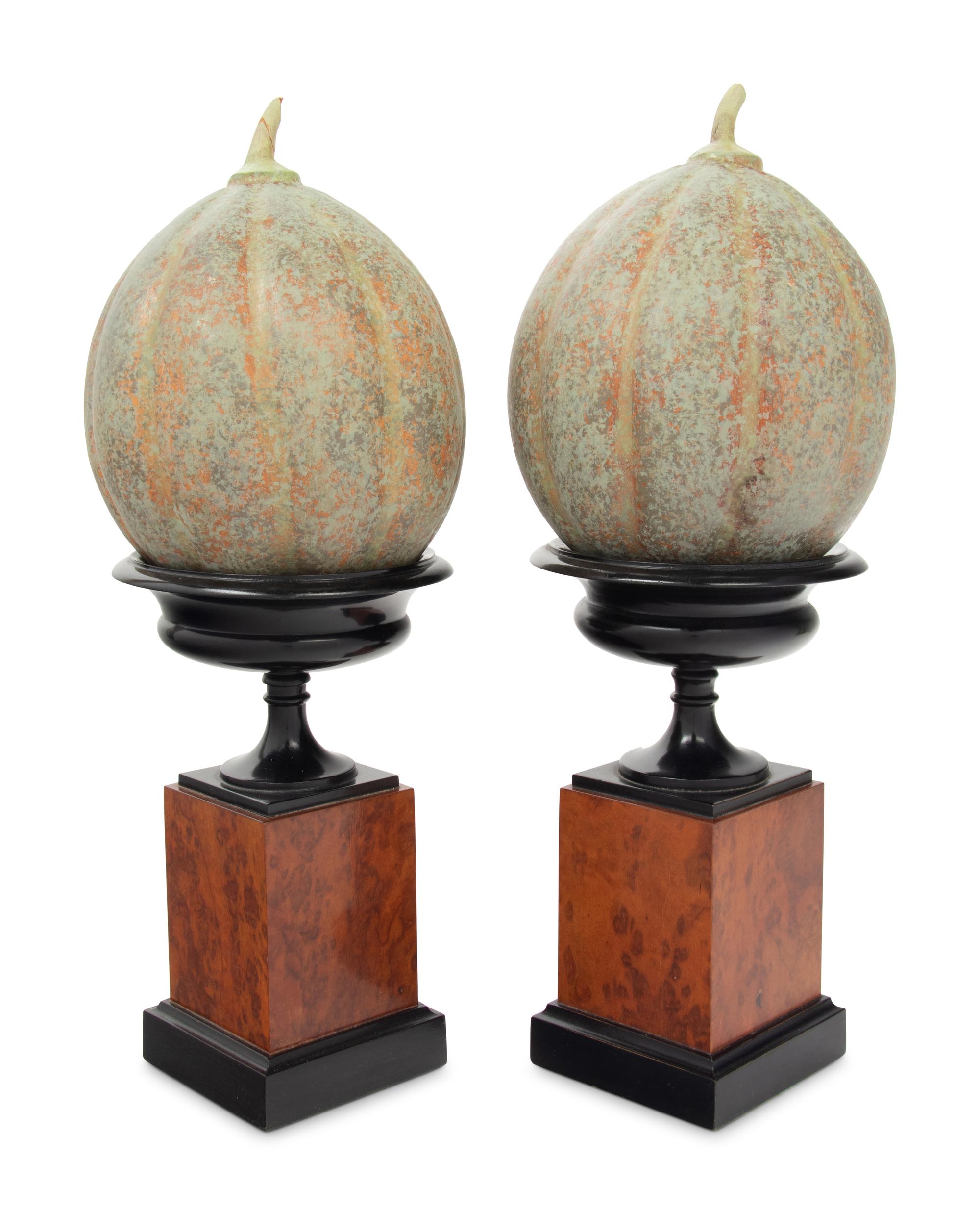 A Pair of Continental Maple Veneered and Parcel Ebonized Urns