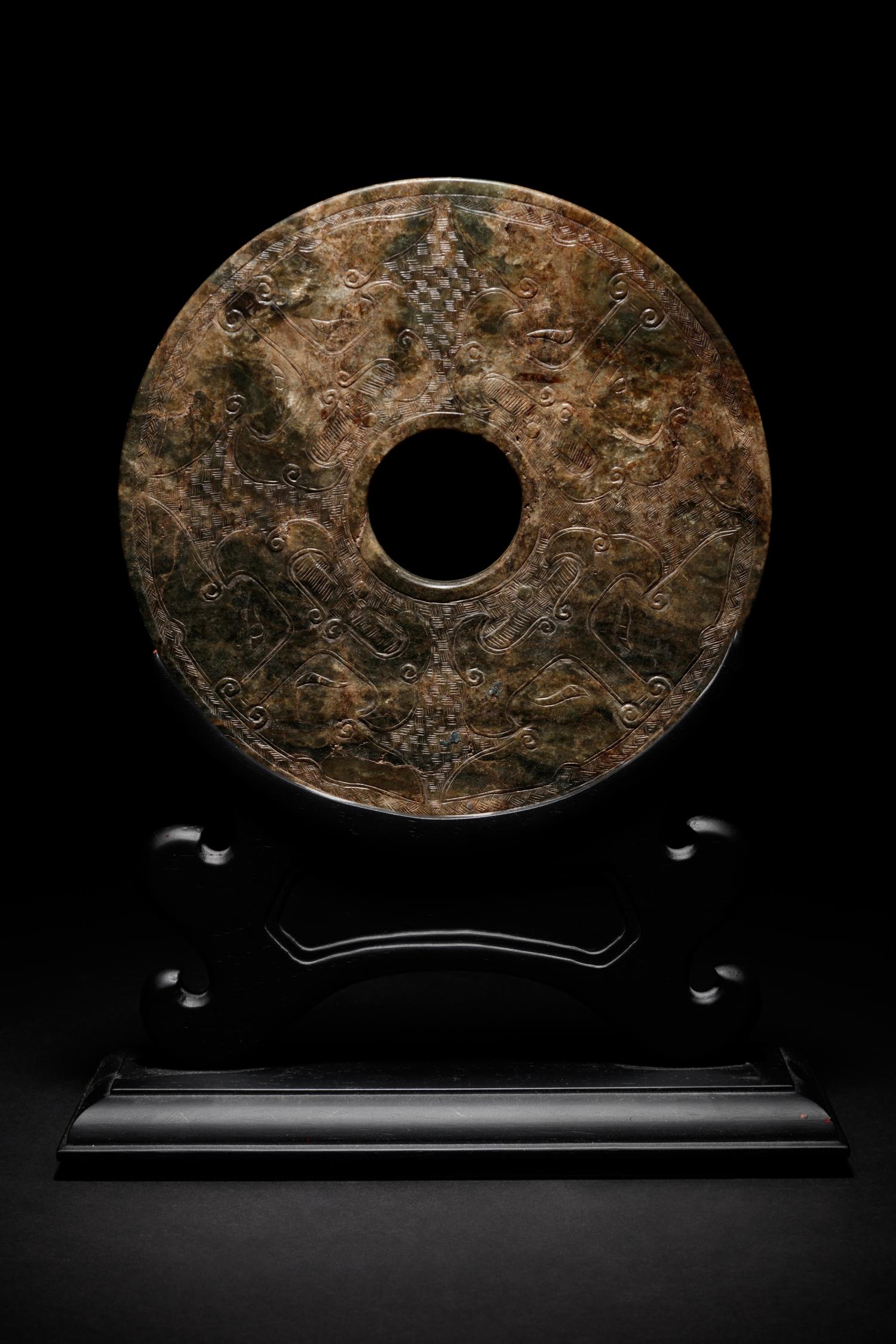 A Chinese Carved Nephrite Jade Bi Disc