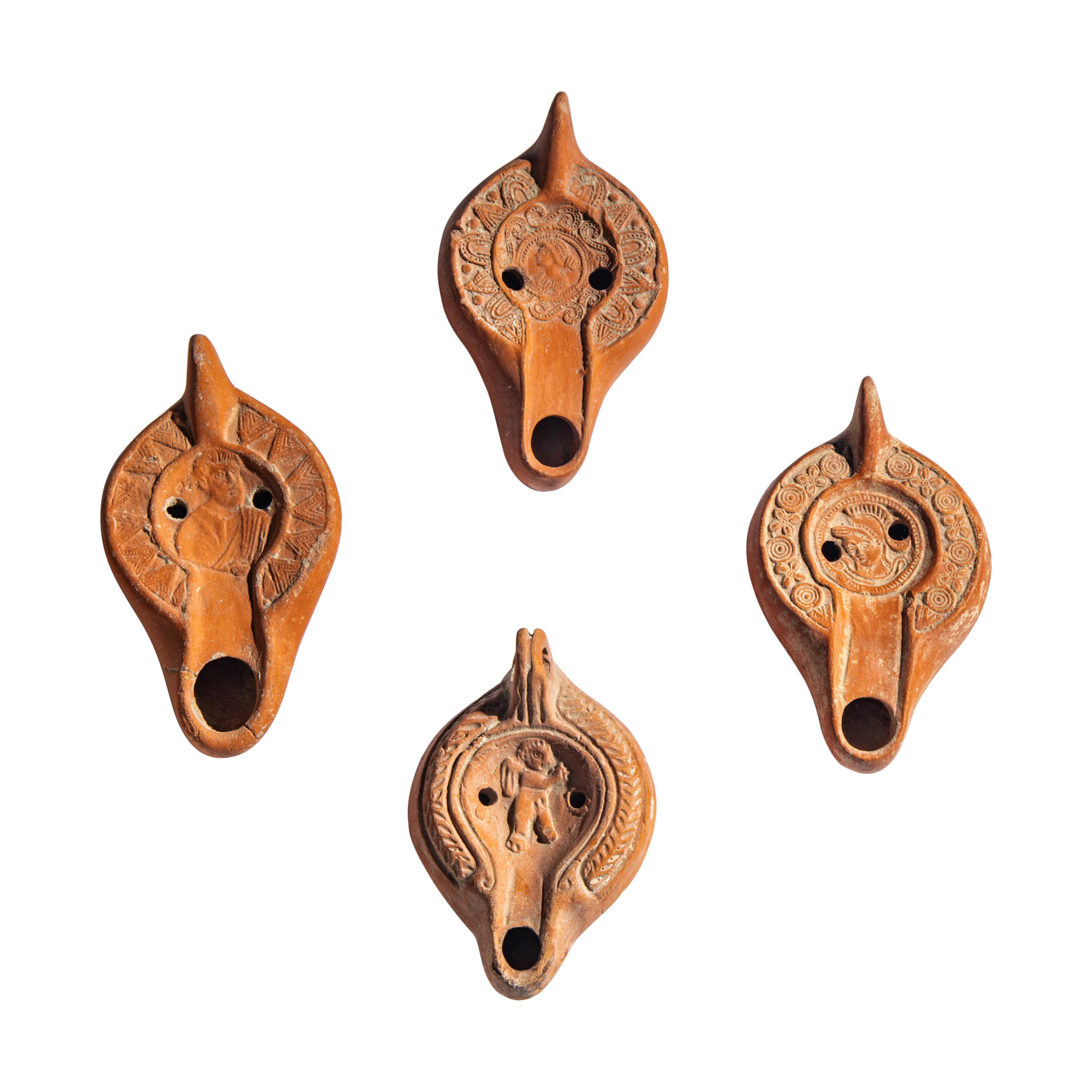 Four Roman Terracotta Lamps