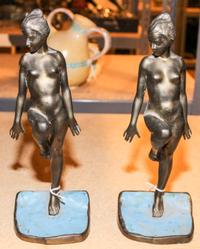 A Pair of Art Deco Cast Metal Figural Bookends Height 10 3/4 inches. — RONSON