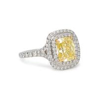 TIFFANY & CO., FANCY INTENSE YELLOW DIAMOND, DIAMOND, AND PLATINUM 'SOLESTE' RING
