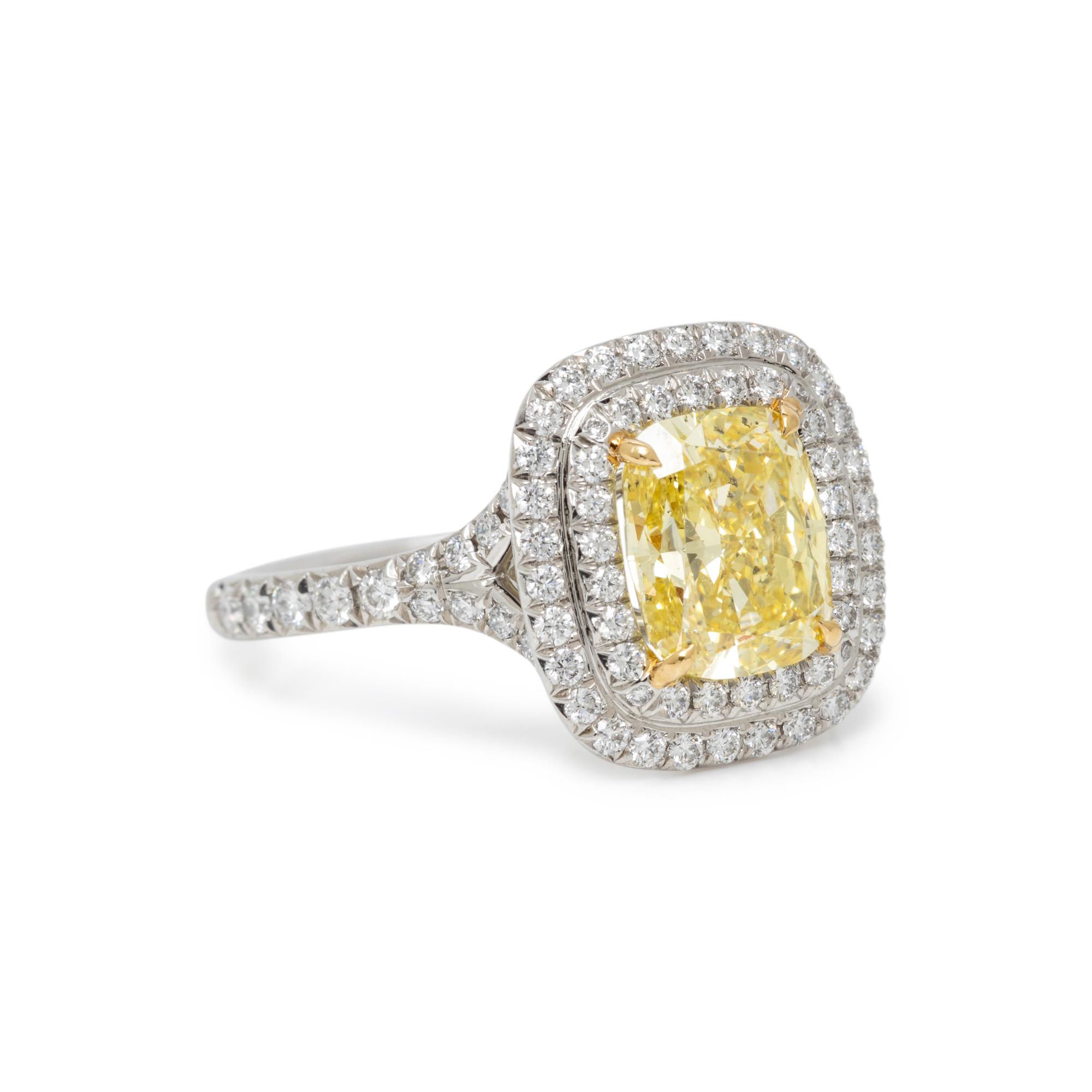 TIFFANY & CO., FANCY INTENSE YELLOW DIAMOND, DIAMOND, AND PLATINUM 'SOLESTE' RING