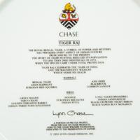 Twelve Lynn Chase Tiger Raj Dinner Plates and a Square Bowl