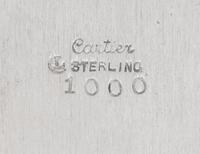 A Set of Eleven Cartier Silver Bread Plates