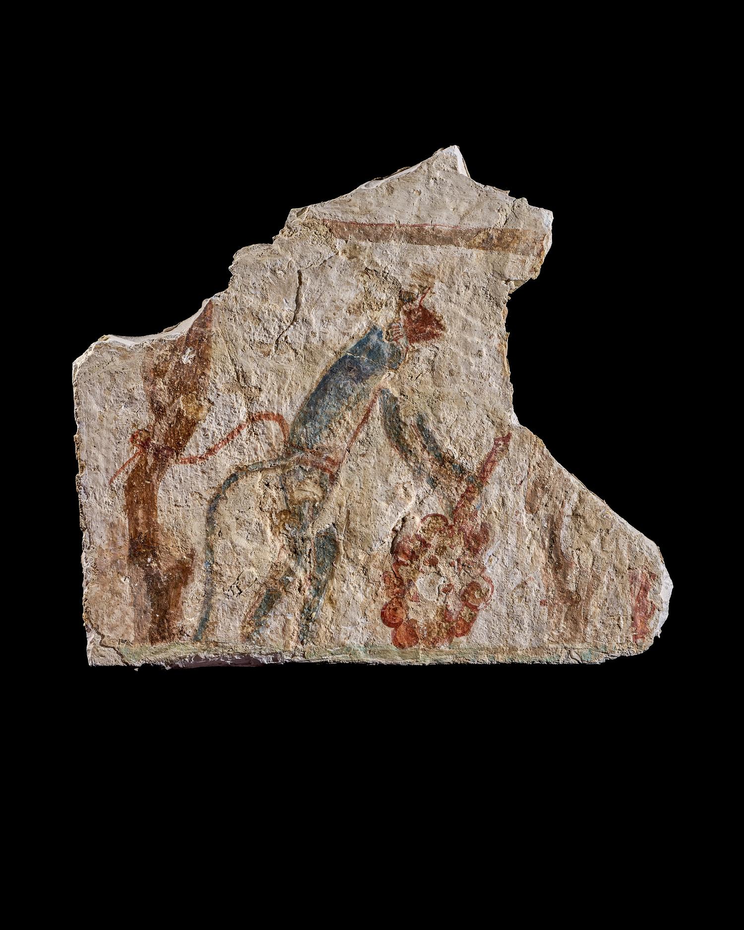An Egyptian Painted Limestone Fragment