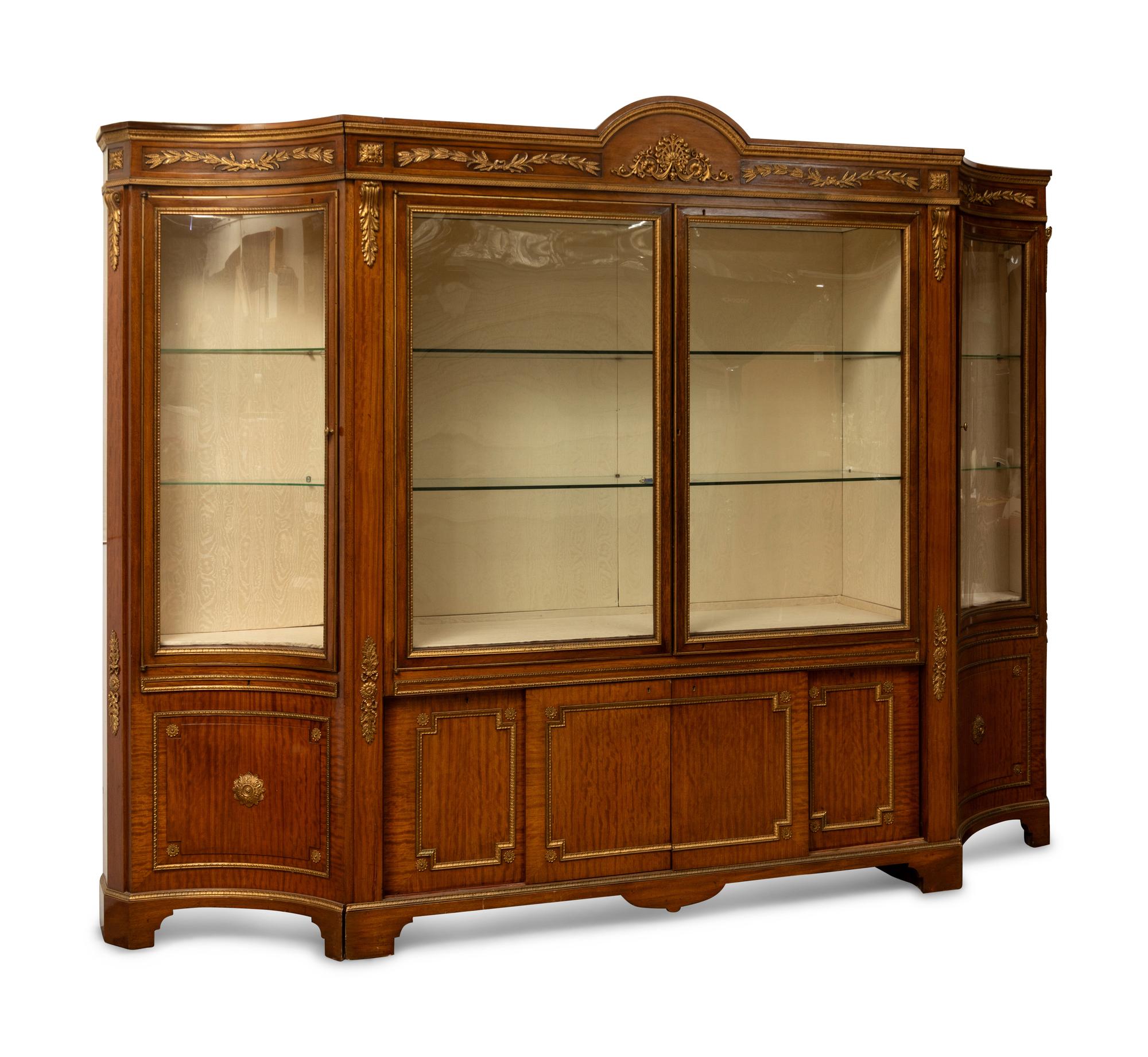 A French Gilt Metal Breakfront Cabinet