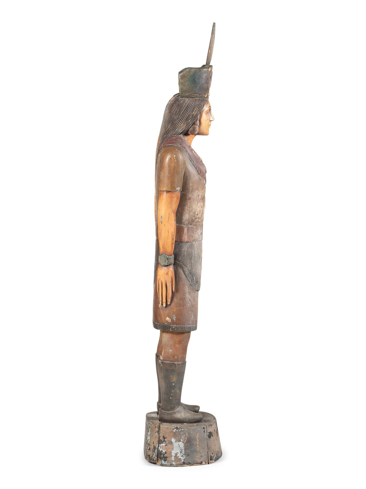 A Carved and Painted Wood Tobacco Trade Figure of a Native American