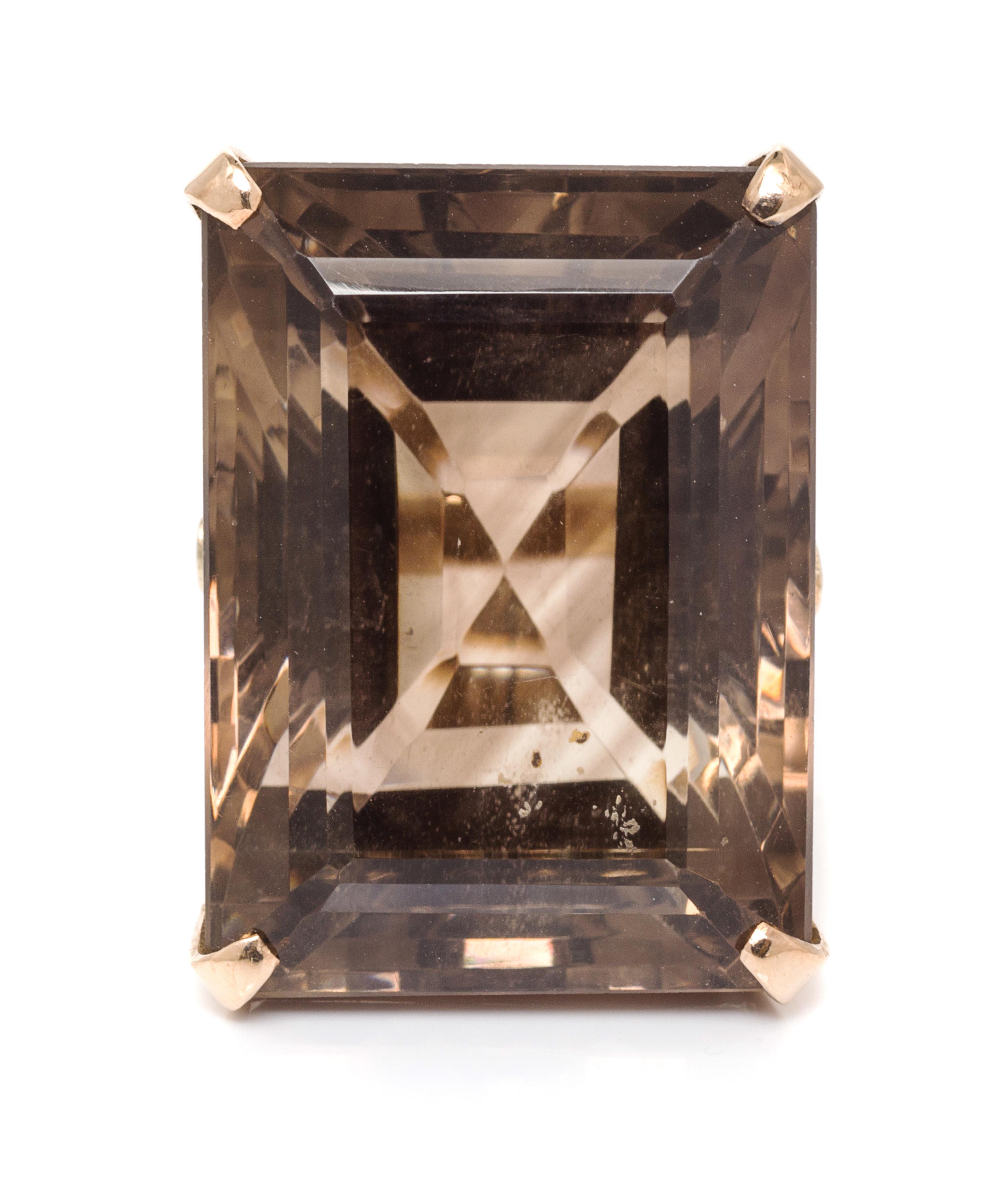 A 14 Karat Yellow Gold and Smoky Quartz Ring, 16.70 dwts.