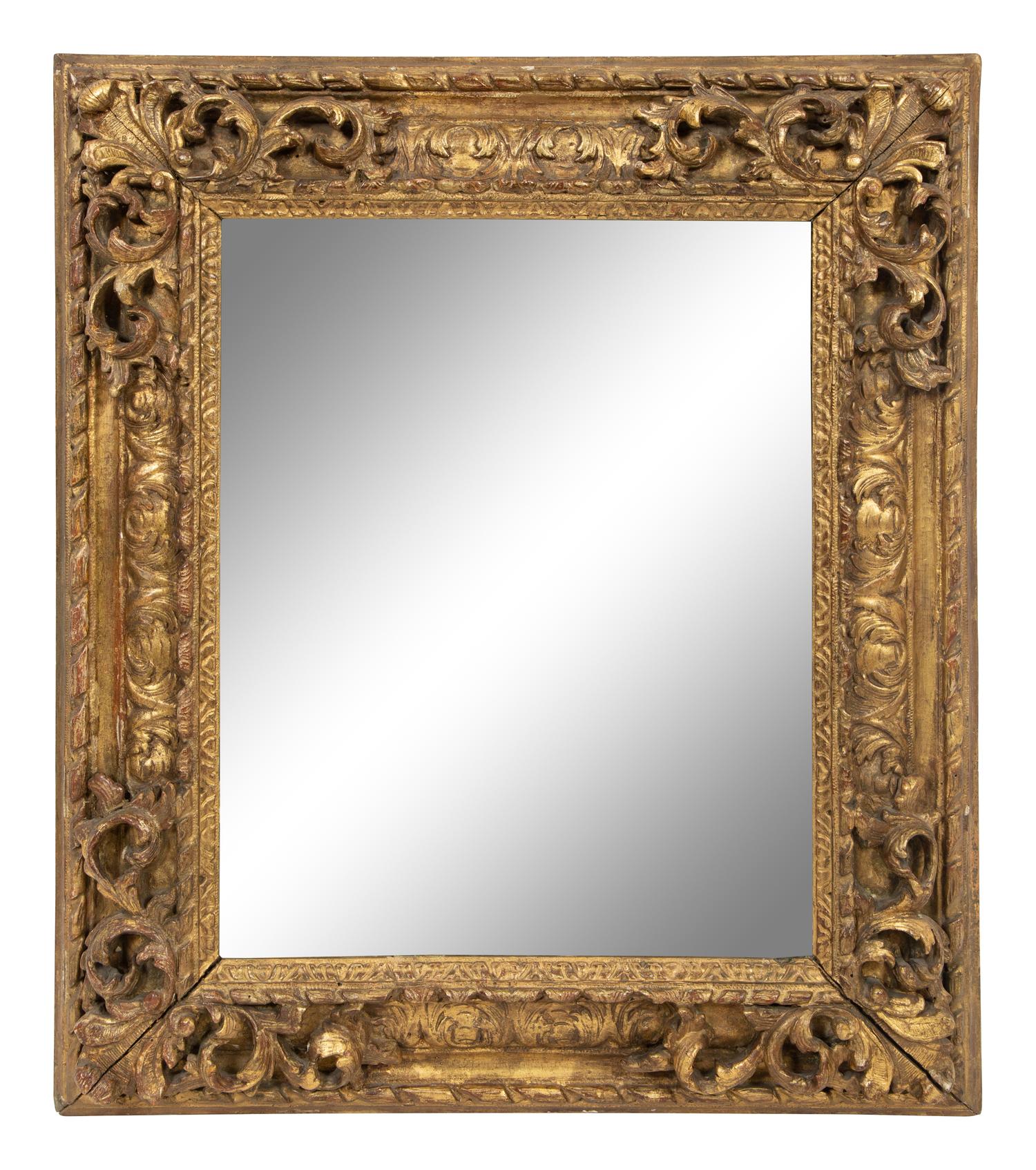 A Continental Carved Giltwood Mirror
