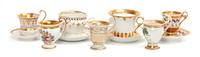A Collection of Continental Porcelain Cups and Saucers Height of tallest cup 4 5/8 inches.