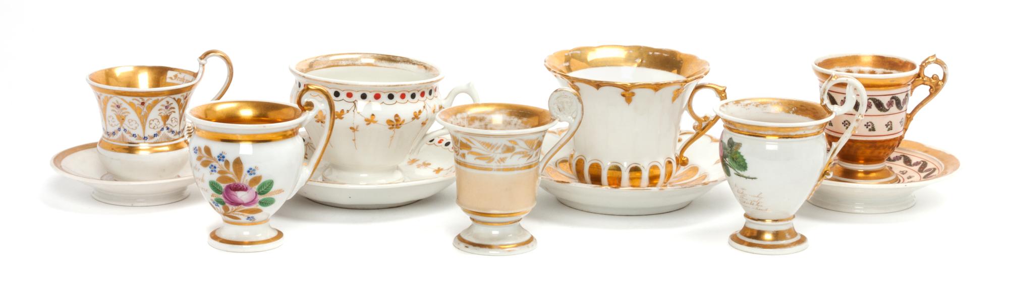 A Collection of Continental Porcelain Cups and Saucers Height of tallest cup 4 5/8 inches.