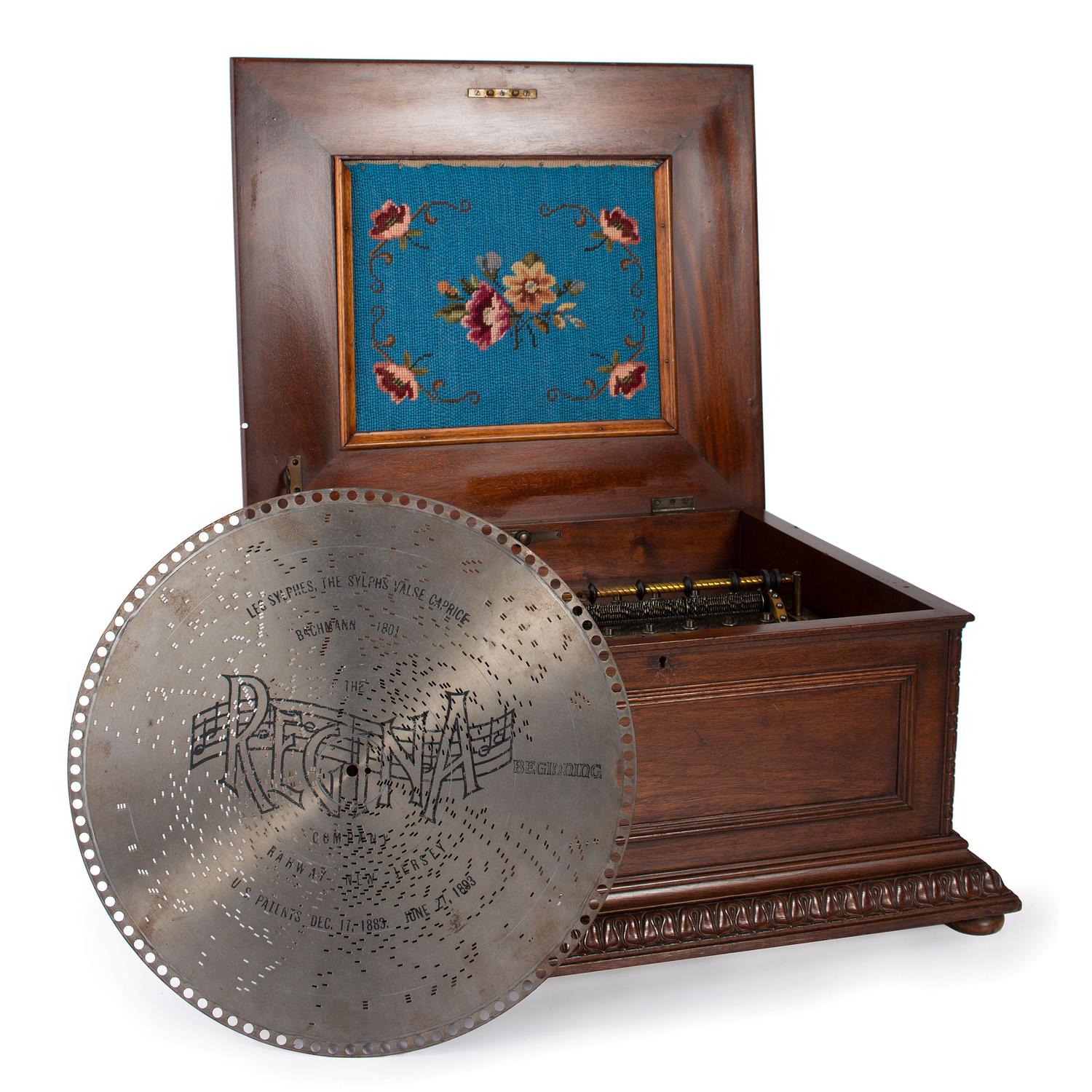 A Regina 15 1/2 Inch Disc Music Box