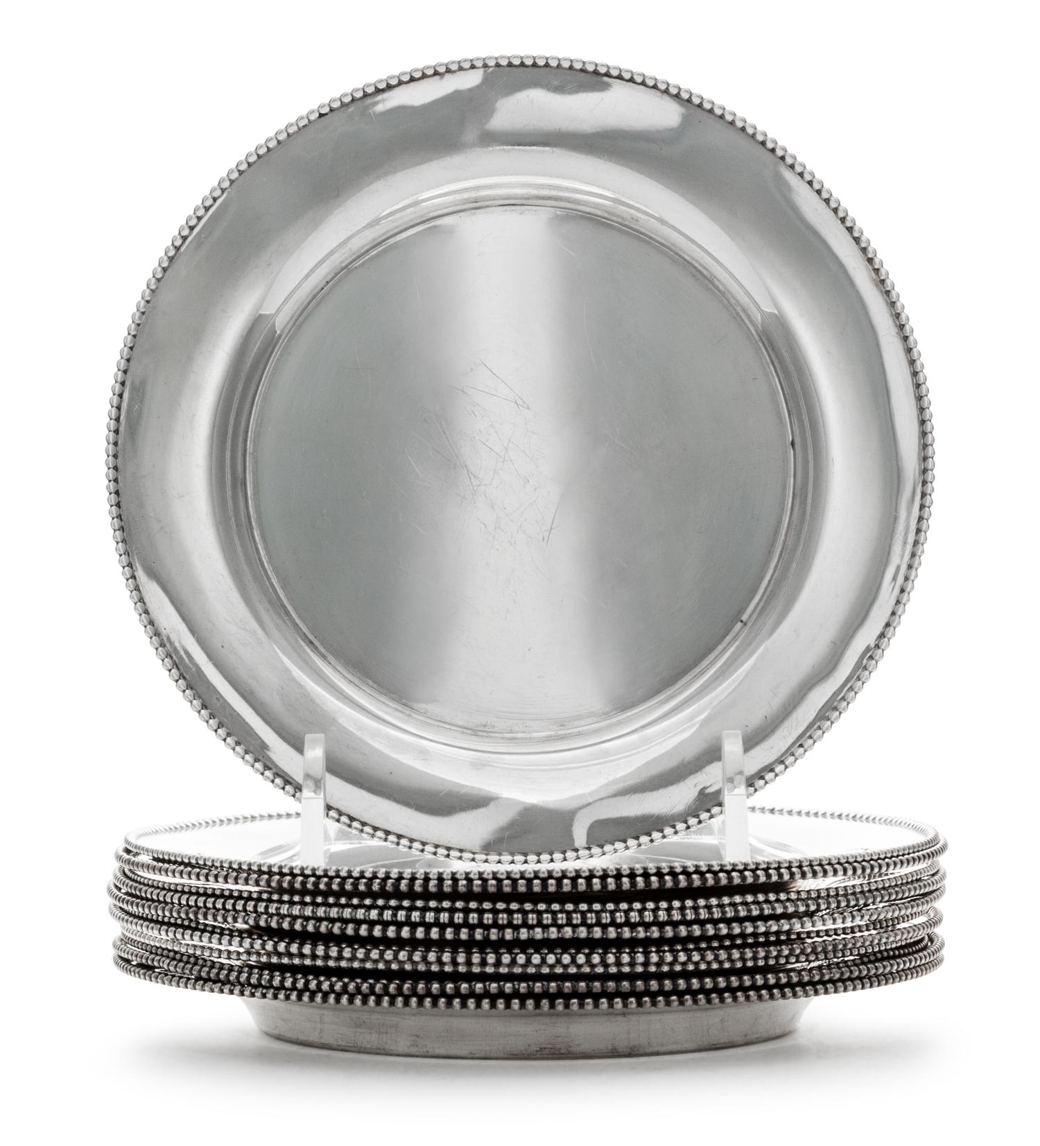 A Set of Twelve American Silver Bread Plates, Wallace Silversmiths, Wallingford, CT, 20th Century, each with beaded edge.