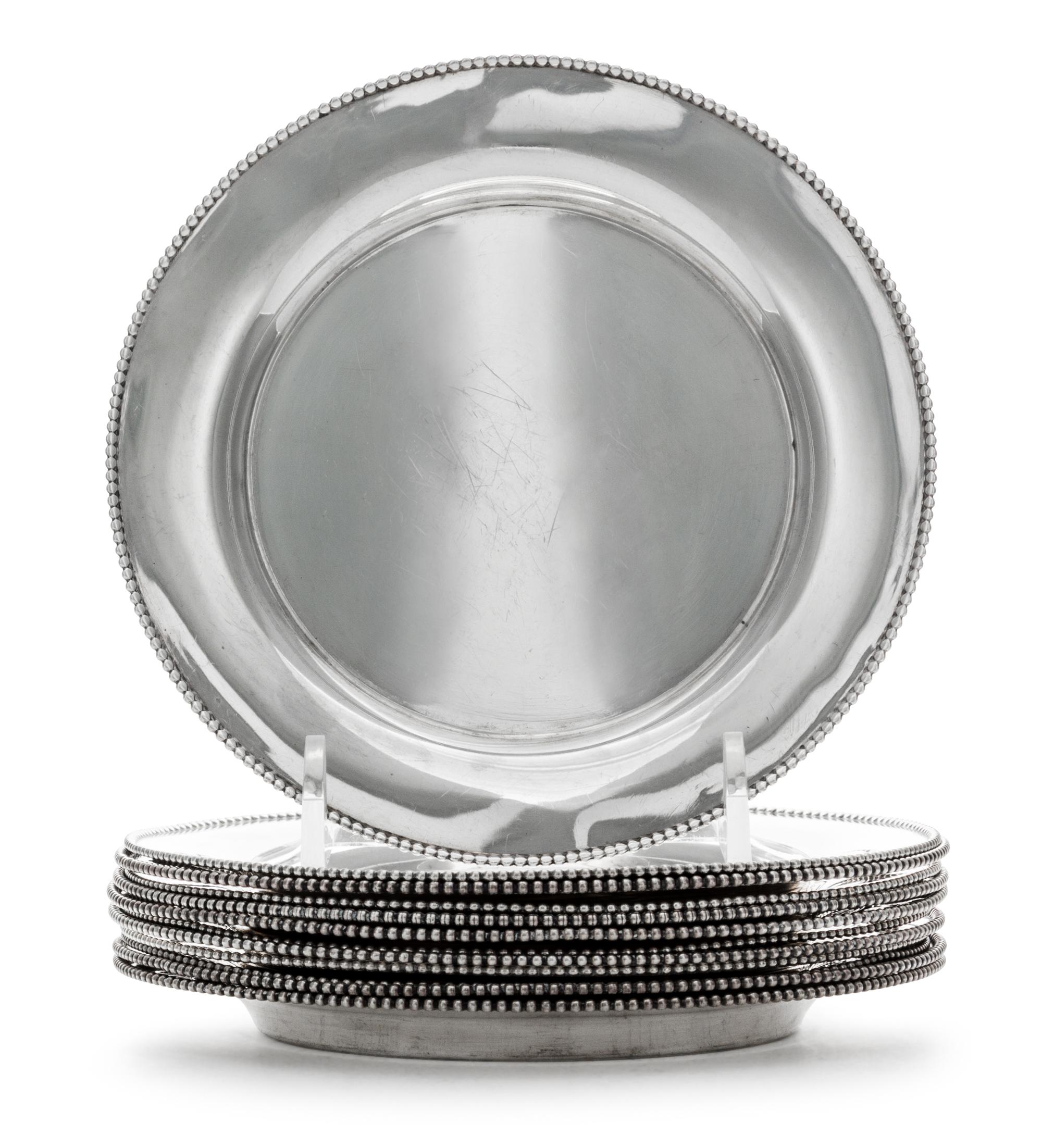 A Set of Twelve American Silver Bread Plates, Wallace Silversmiths, Wallingford, CT, 20th Century, each with beaded edge.